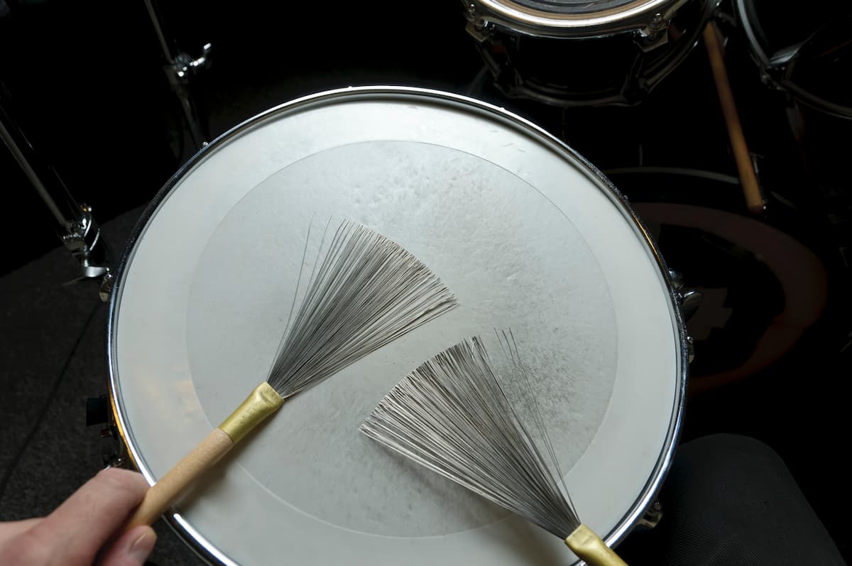 Drum brushes on a snare drum