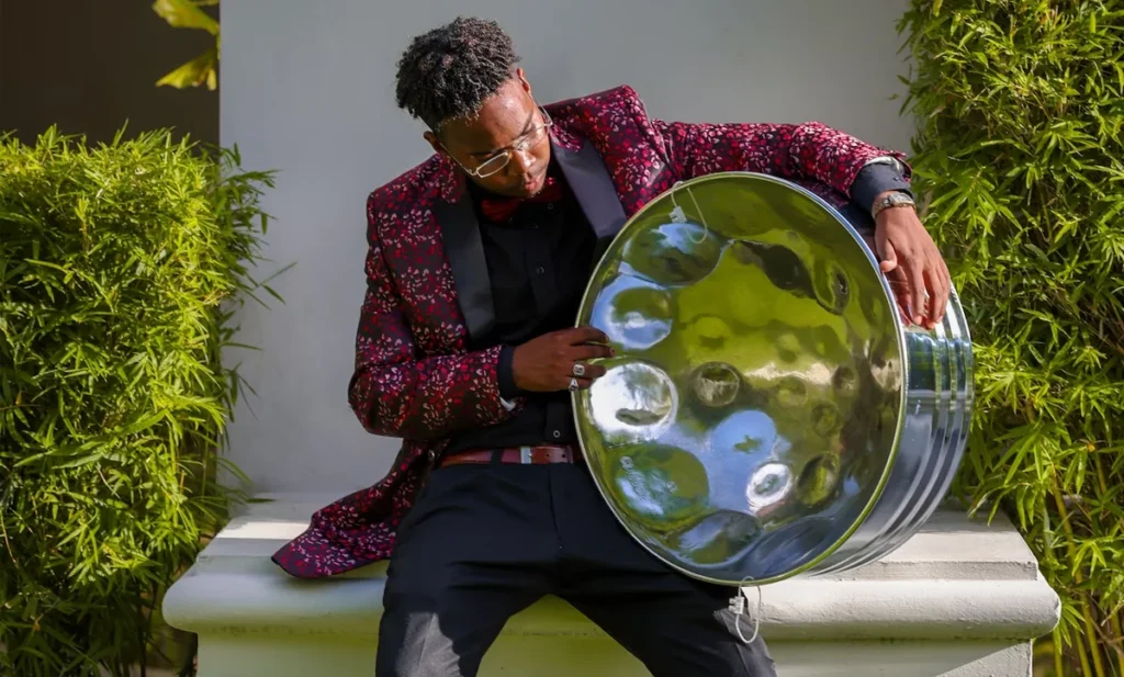 Man holding Steel Pan drum