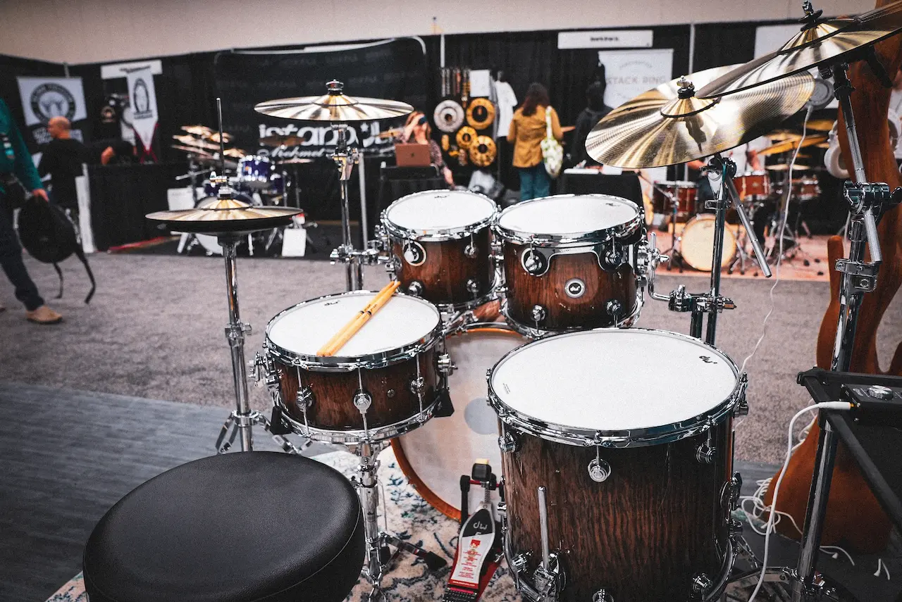 NIck Cesarz's photo from PASIC 2023 of the Drum Workshop DWe setup at the booth