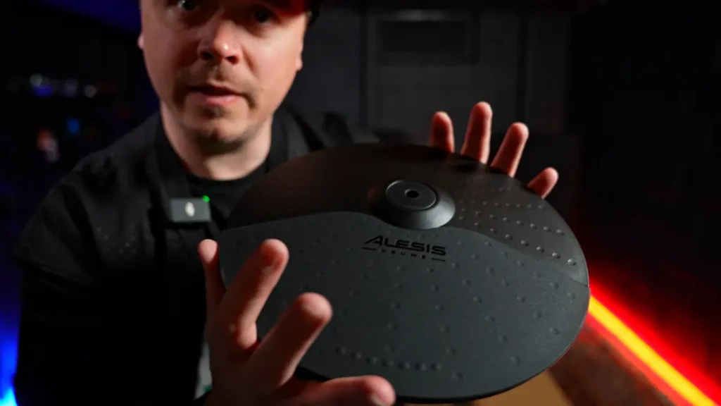 Nick showing off a cymbal pad on the Nitro Pro